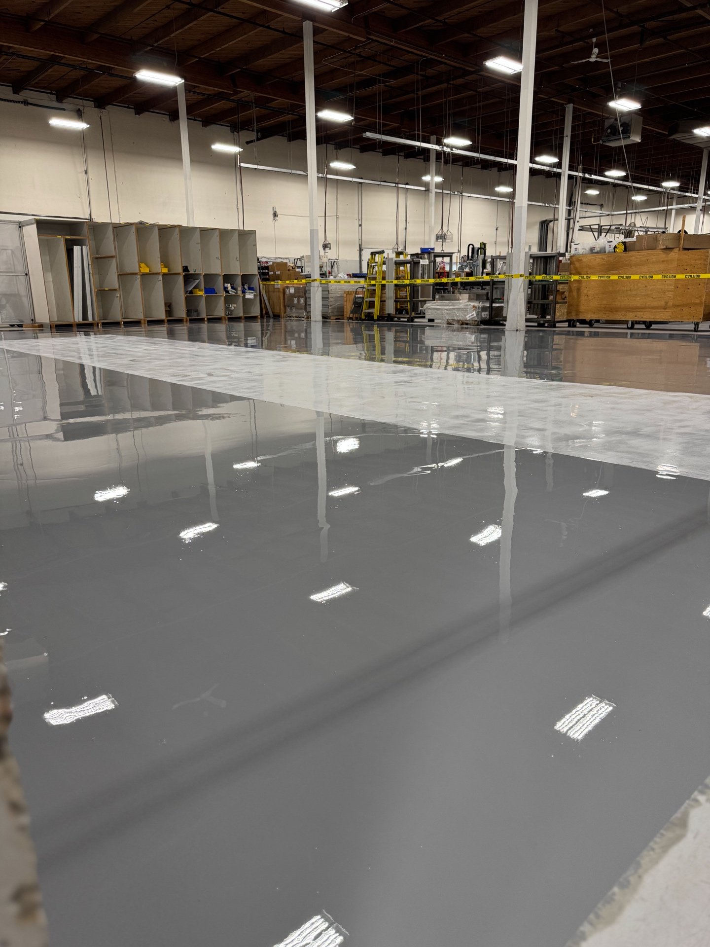 Commercial warehouse dark grey epoxy floor in Delta BC