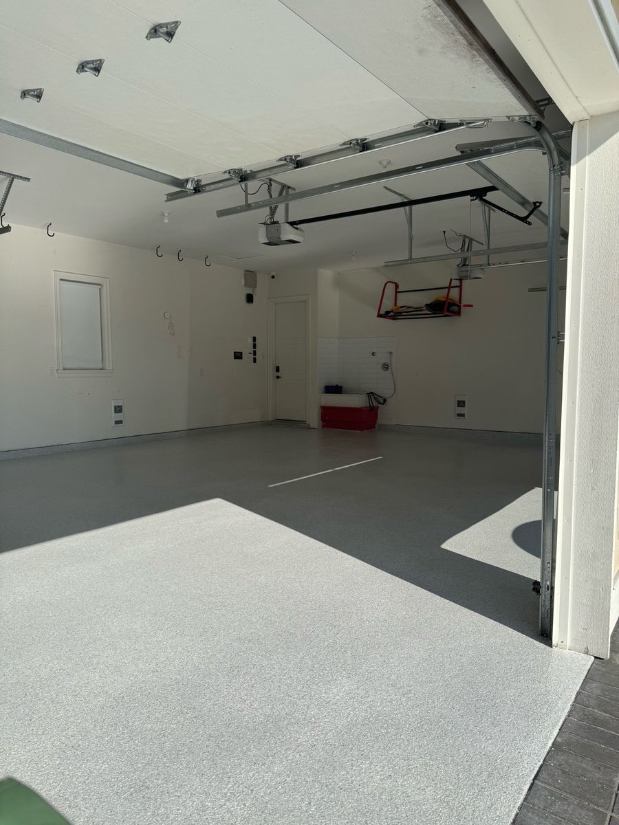 Clean white garage with flake epoxy floor in Richmond BC