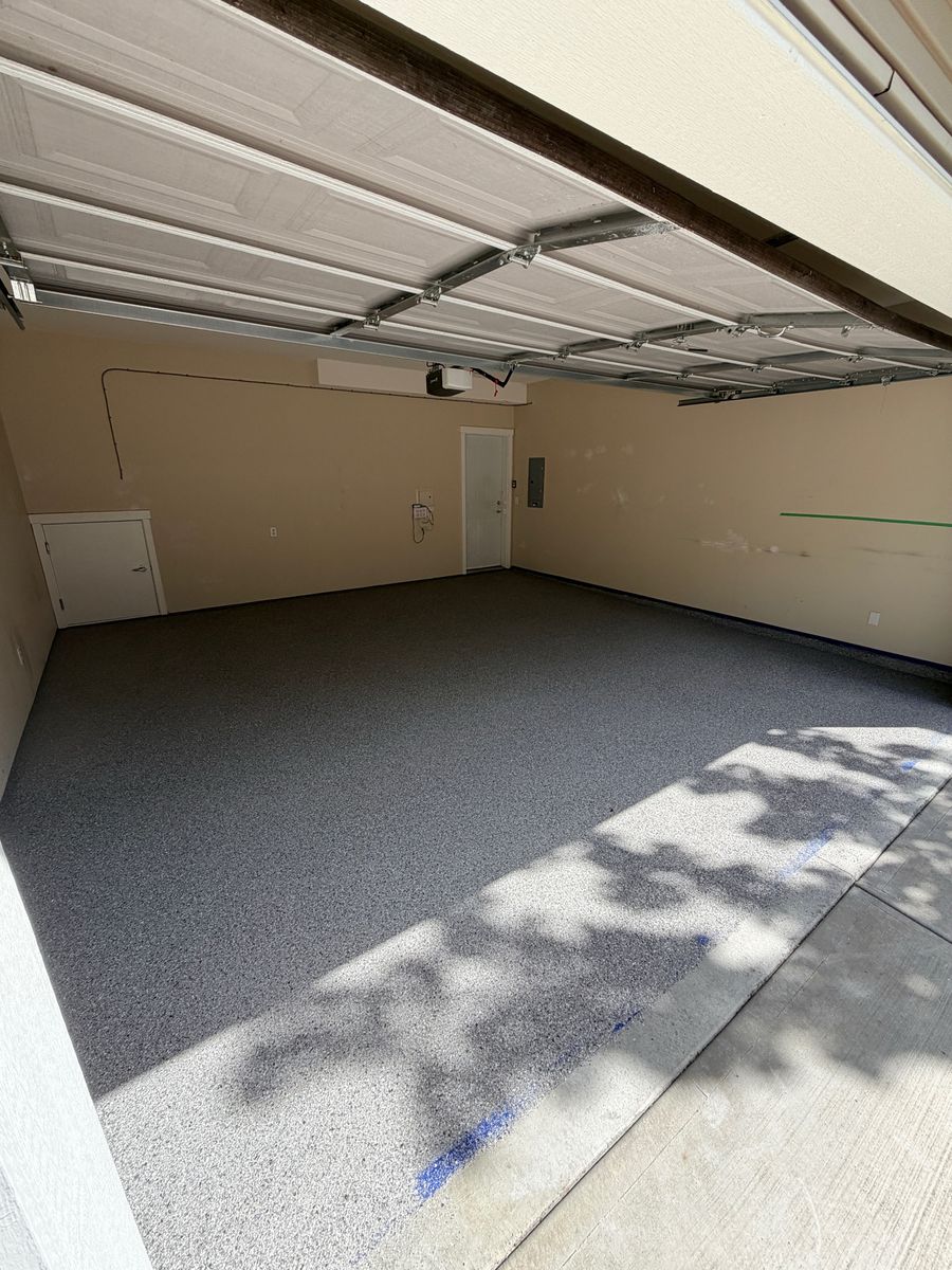 Two-car garage with grey flake epoxy coating in Burnaby BC